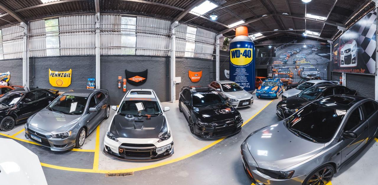 Panoramic view of Vila Nair garage filled with sports cars in São Paulo, Brazil.